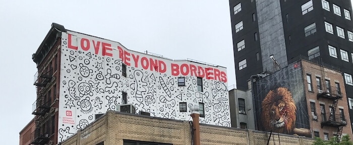Love Beyond Borders and Lion Mural on Lower East Side Street Art Tour