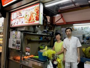 Famous Stall for Fried Oyster Pancakes at Maxwell Hawker Center. Crazy Rich Asians Singapore
