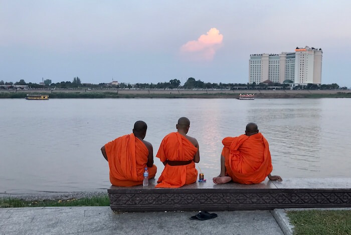 Monks at Sisawath Quay. Phnom Penh Itinerary for 5 Days in Cambodia & Best Getaway from Singapore