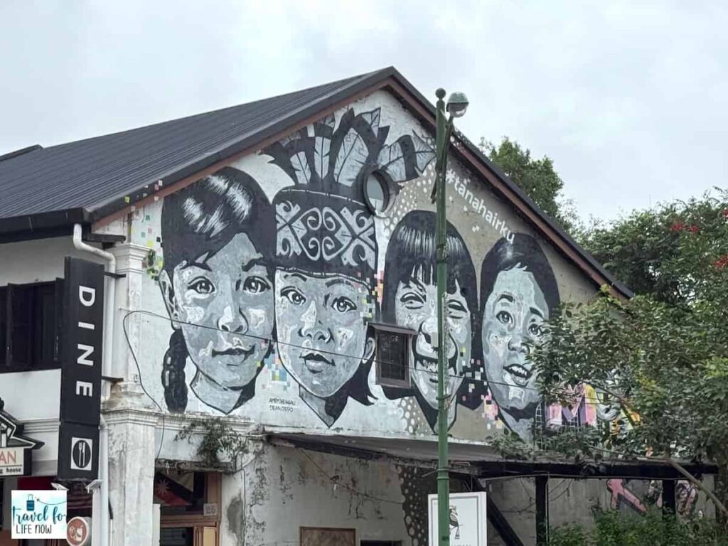 Mural of four people representing diversity in Sarawak.