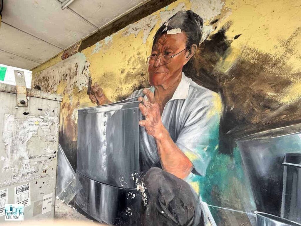 Mural of a Tinsmith by Leonard Siaw