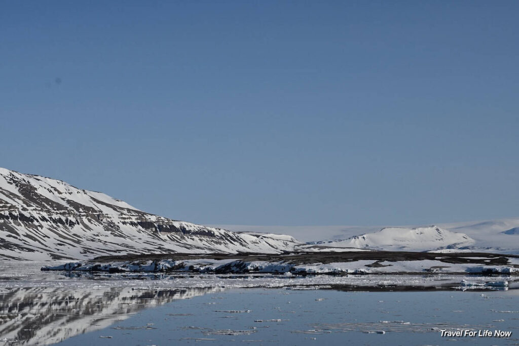 Photo of mountain and water on Spitsbergen Polar Bear Arctic Cruise
